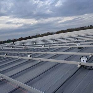 Sloped Standing Seam Metal Roof with Solar Racking