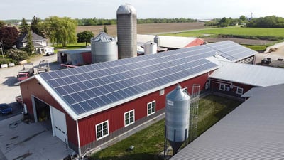 Solar panels on dairy farm barn roof in New York